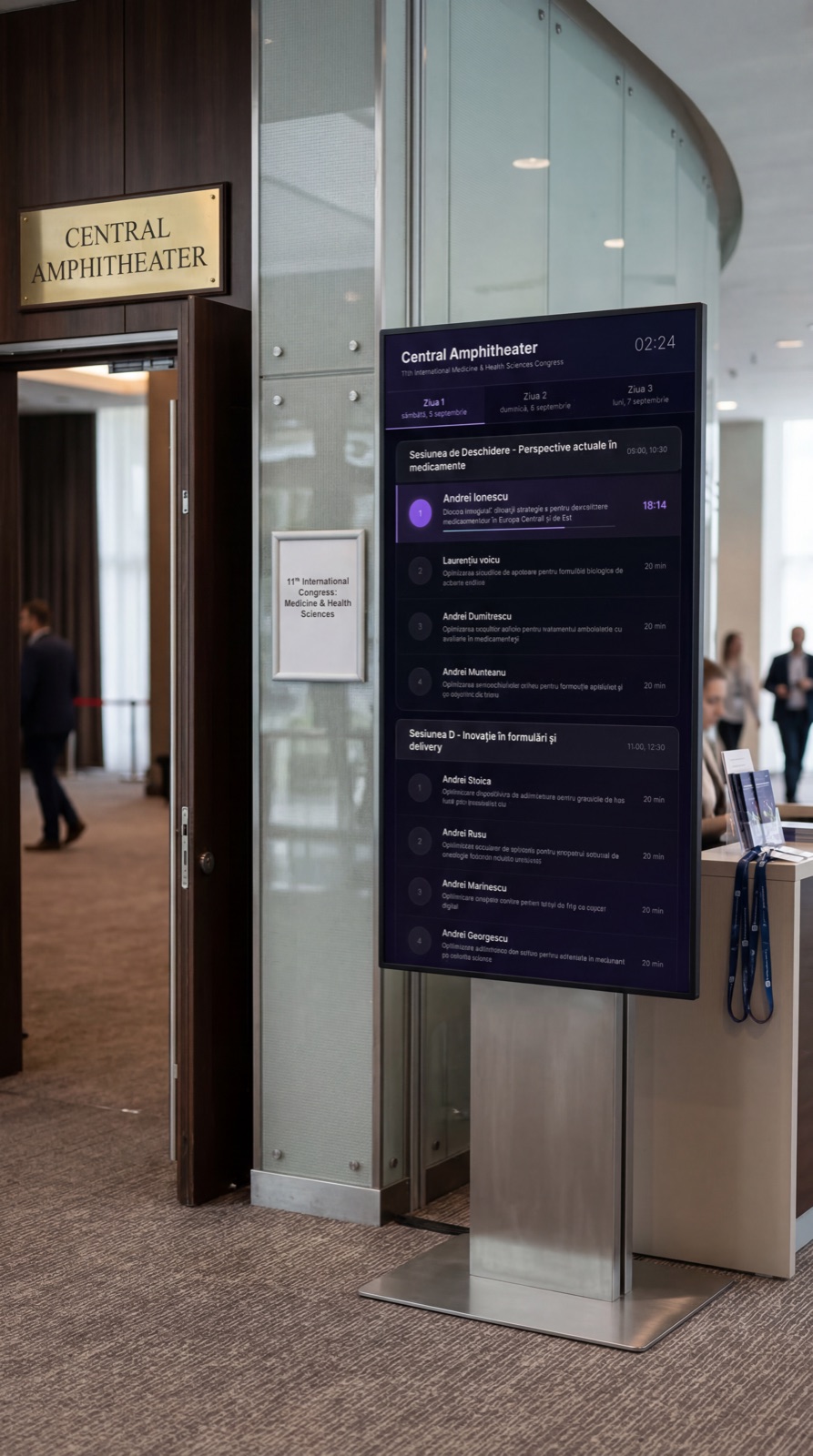 Display StartSync pe suport cu programul sesiunilor la conferință